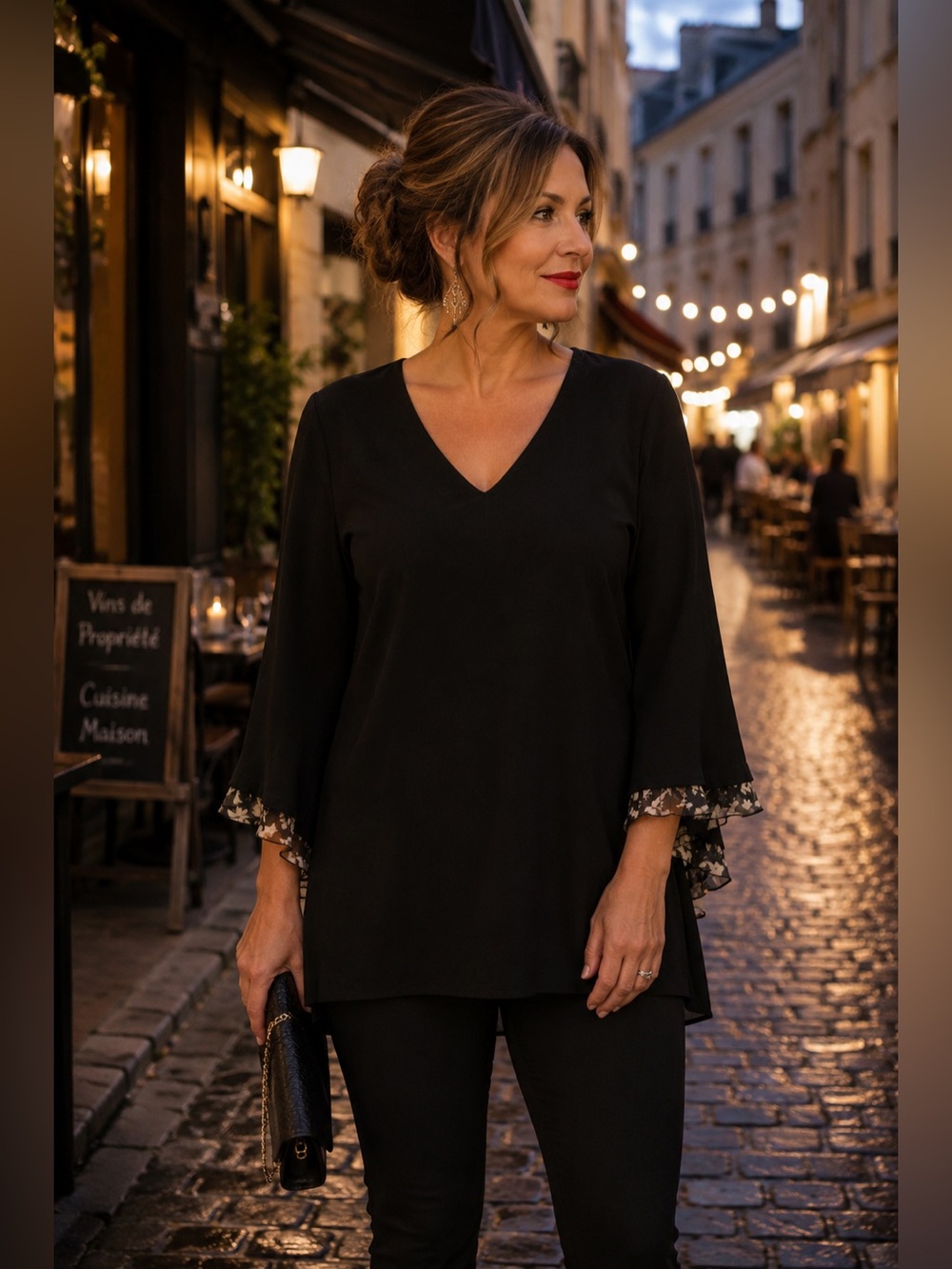 Elegant V-Neck Black Bell-Sleeve Top with pretty patterned cuffs.